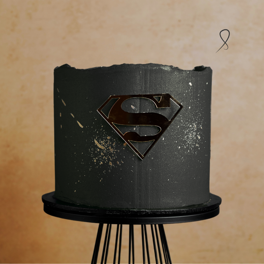 Matte Black Super Dad Cake with gold S topper – modern buttercream Father’s Day cake design