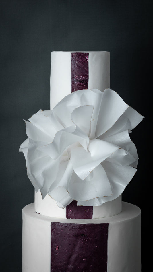 Petal column statement cake corporate company cake