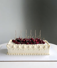 Sheet cake with cherries